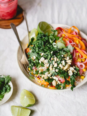 Asian-style salad with carrot ribbons, herbs, and peanuts.
