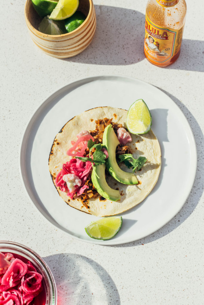 A vegan take on the classic taco carnitas, filled with spiced jackfruit. #vegan #tacos #jackfruit