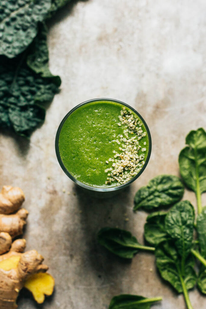 A simple easy everyday green smoothie made with kale, spinach, ginger, and coocnut.
