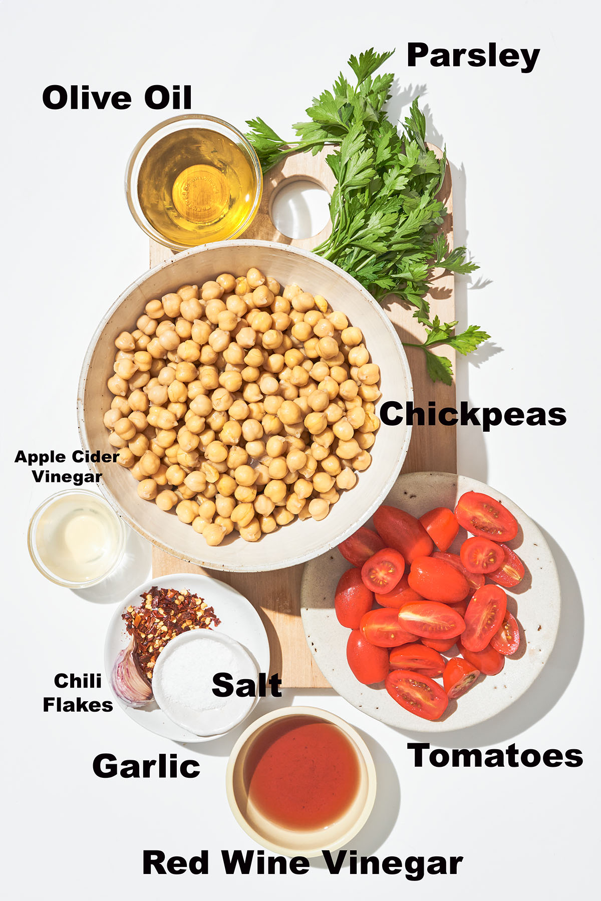 Chickpea salad ingredients with labels.