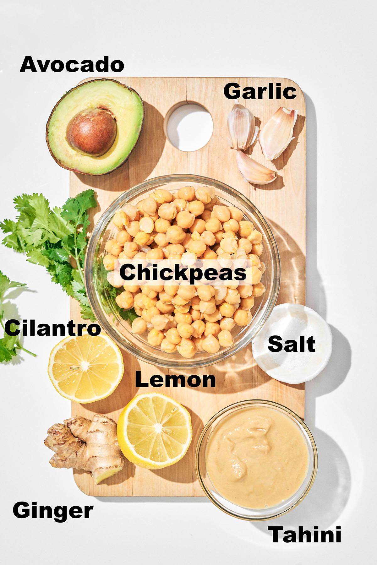 Avocado hummus ingredients with labels.