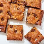 Top-down view of chocolate chip bars cut into squares.