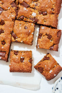 Top-down view of chocolate chip bars cut into squares.